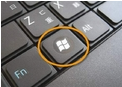 Locate the Windows key on the keyboard.